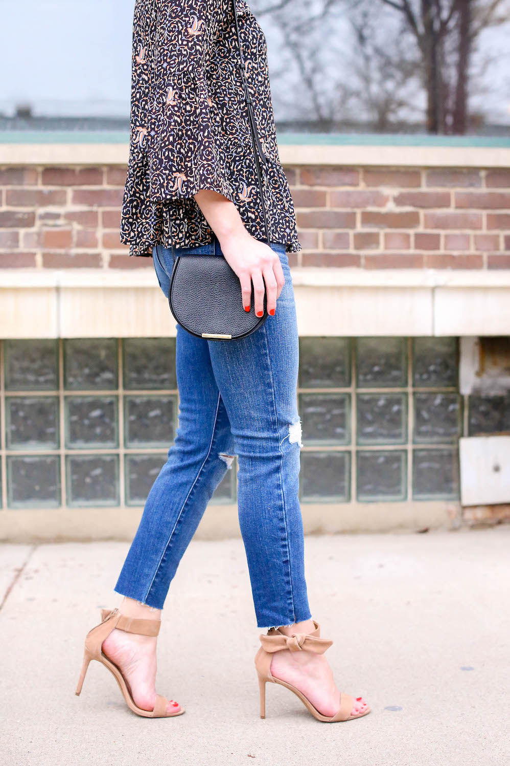 bow heels and distressed jeans